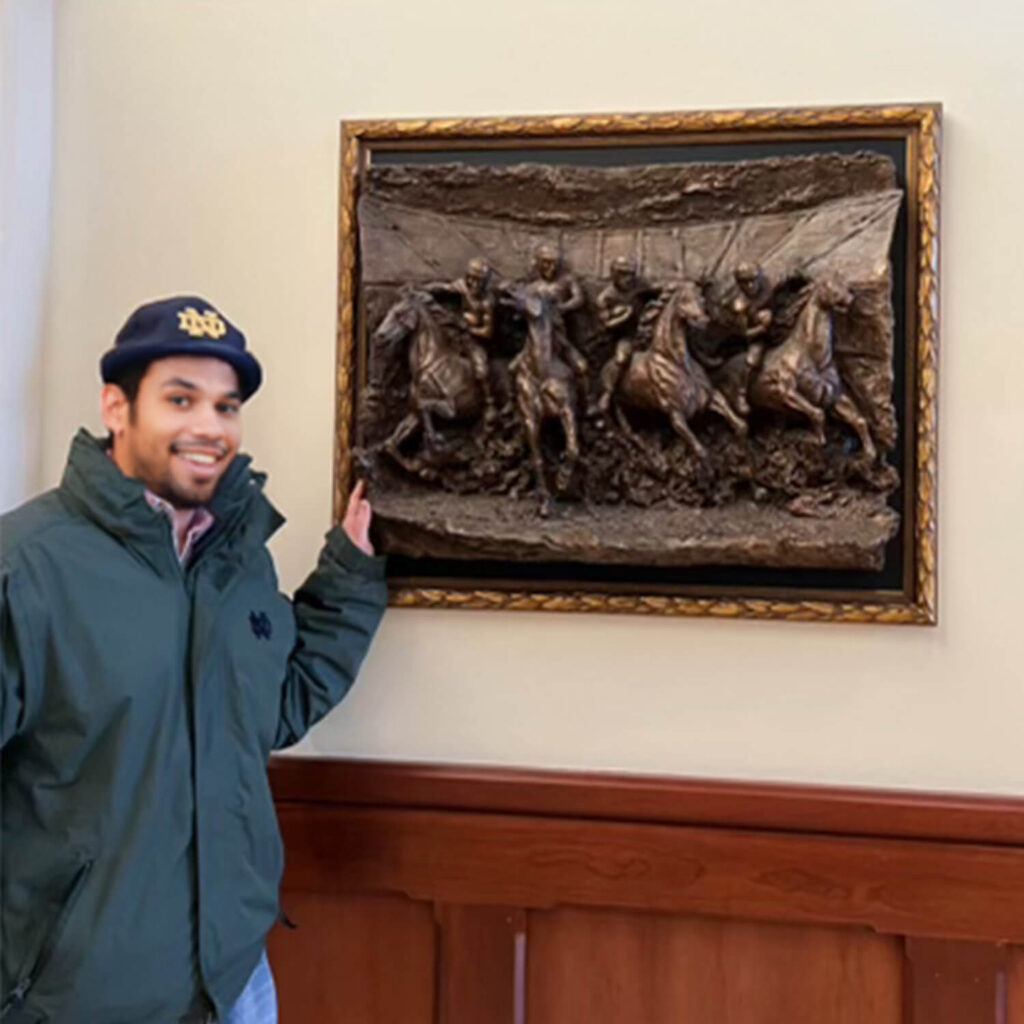 Four Horsemen relief sculpture installed at the Eck Visitors Center, part of the Spirit Collection, presented to NDAA President Chuck Lennon.